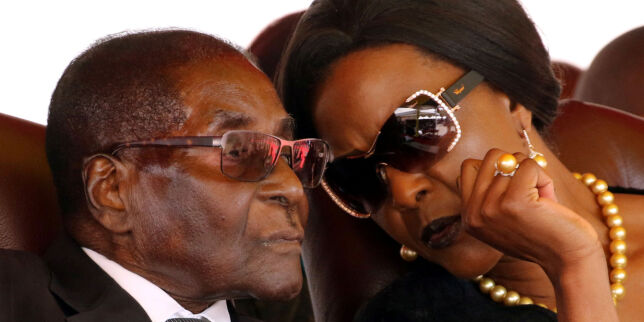 President Robert Mugabe and his wife Grace attend the burial of two independence luminaries, Maud Muzenda and George Rutanhire, in Harare, Zimbabwe August 26,2017. REUTERS/Philimon Bulawayo TPX IMAGES OF THE DAY