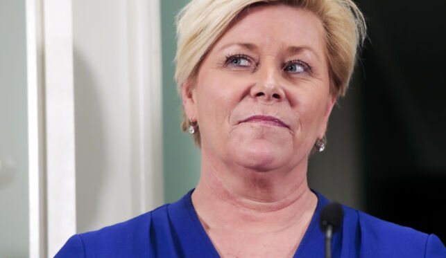 JELØYA 20180114.
Partilederne Erna Solberg (H), Siv Jensen (Frp) (bildet) og Trine Skei Grande (V) på Hotel Jeløy Radio etter at Venstre har besluttet at de vil gå inn i regjering med Høyre og Frp.
Foto: Lise Åserud / NTB scanpix
