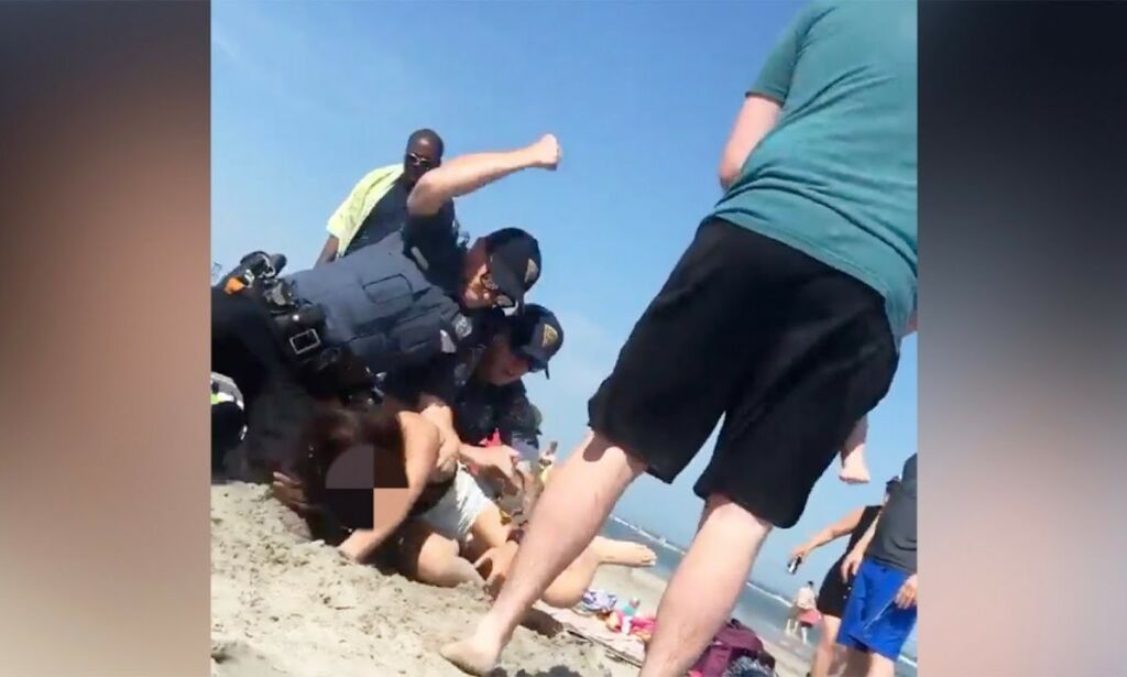 Stranddramaet går verden rundt: - Tok fram kameraet mitt da hun falt sammen